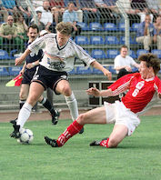 Jeff Saibene (r.) during his active playing career.